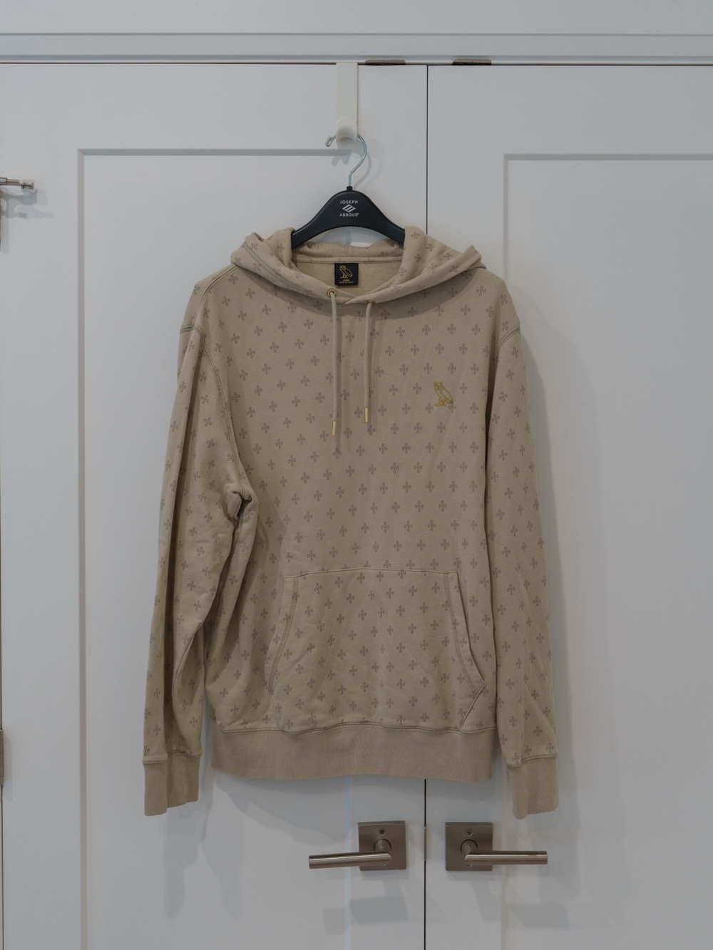 OVO Beige Hoodie with All-Over Fleur Pattern and Gold Logo